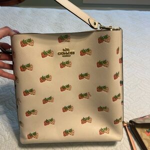 Coach Molly bucket bag strawberry print
